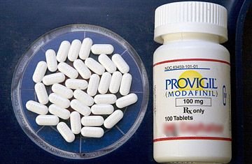 Modafinil bottle and pills: Photo: http://img.timeinc.net/time/daily/2009/0903/360_provigil_0317.jpg