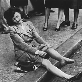 Woman tries on new nylon stockings in the 1940s